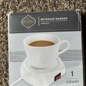 Dashing  electric beverage warmer designed to keep drinks like coffee&tea warm